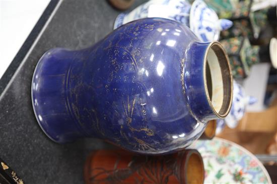 A Chinese gilt-decorated blue ground baluster jar, 19th century, 35cm, wood stand and cover, gilt decoration worn